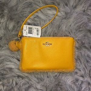 NWT Coach Fuzzy Yellow Wristlet